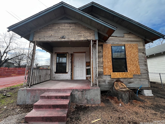 bungalow-style home featuring covered porch