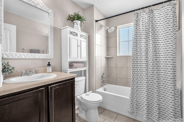 full bathroom with shower / tub combo with curtain, vanity, toilet, and tile patterned flooring