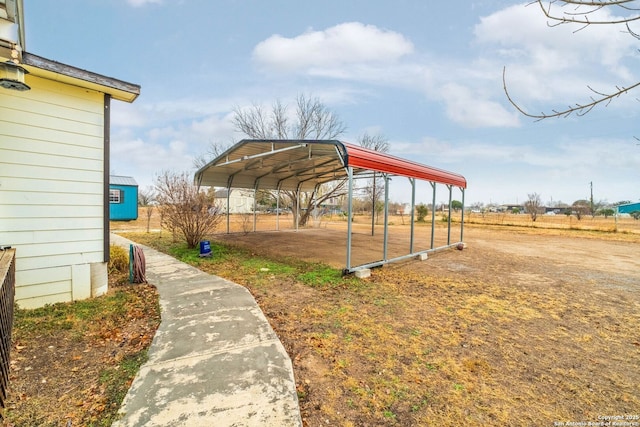 view of yard with a carport