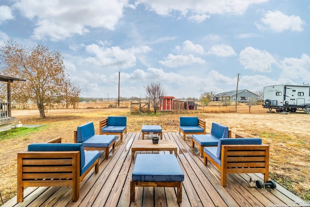 wooden deck with an outdoor hangout area