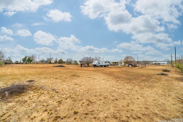 view of yard featuring a rural view