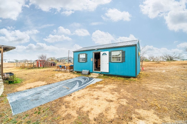 view of front facade with an outbuilding