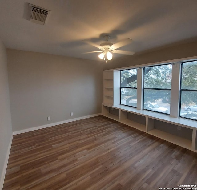 interior space featuring dark hardwood / wood-style floors and ceiling fan