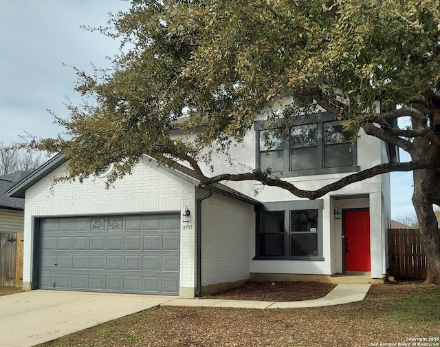 view of front of property with a garage