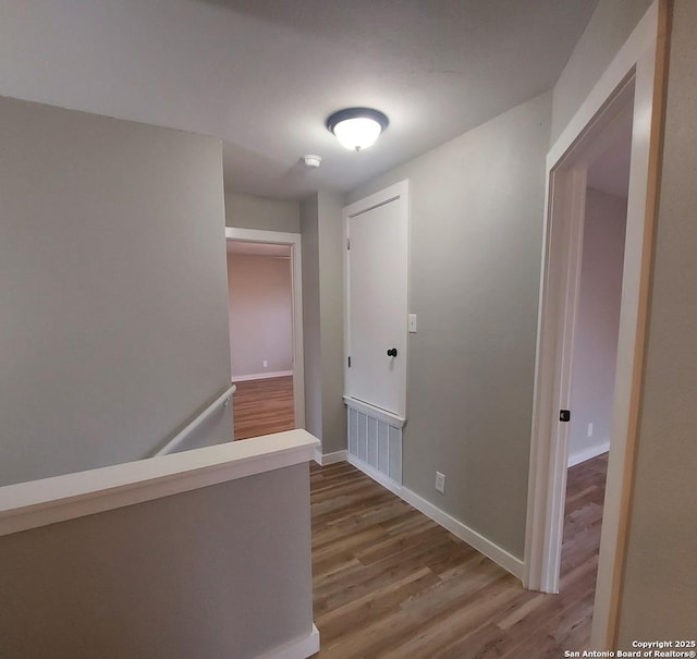 hall featuring hardwood / wood-style floors