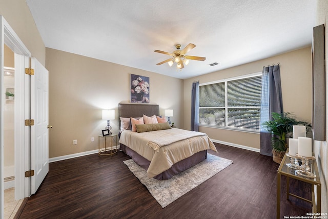 bedroom featuring ceiling fan and dark wood-type flooring