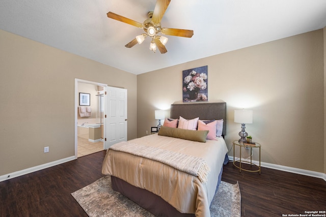 bedroom featuring dark wood-type flooring, ceiling fan, and ensuite bath