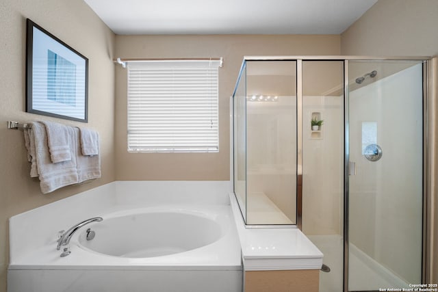 bathroom with independent shower and bath