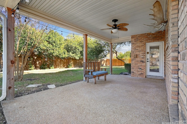 view of patio featuring ceiling fan