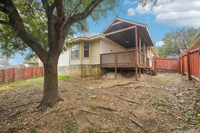 rear view of house with a deck