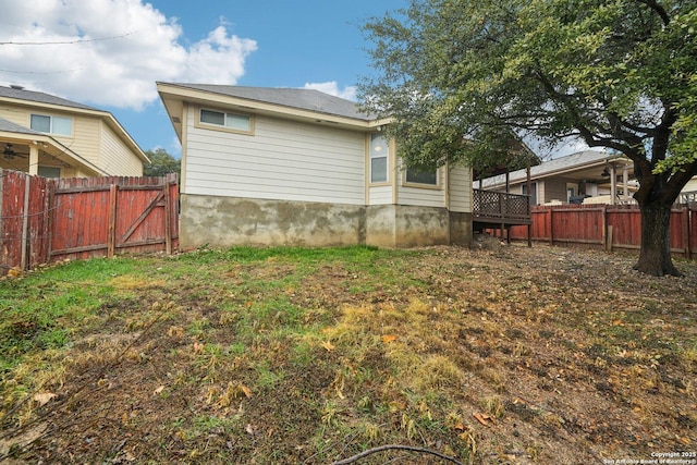 view of yard with a wooden deck