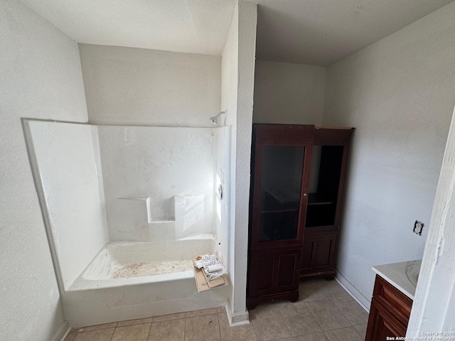 bathroom with vanity and tile patterned flooring