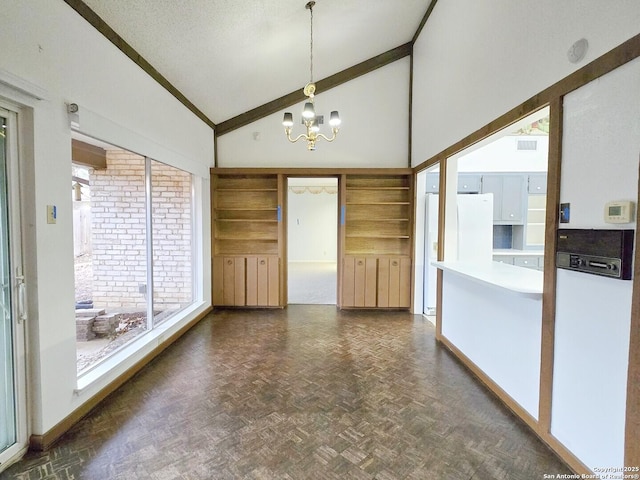 interior space featuring a chandelier, high vaulted ceiling, and dark parquet floors