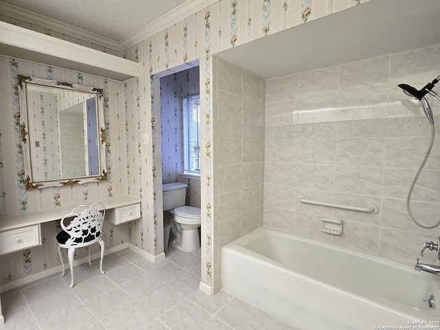 bathroom with tile patterned floors, toilet, tiled shower / bath, a textured ceiling, and ornamental molding