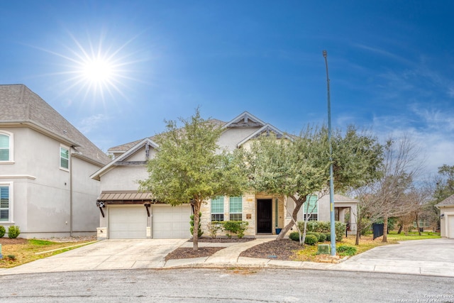 view of front of property with a garage