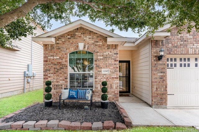 property entrance with a garage