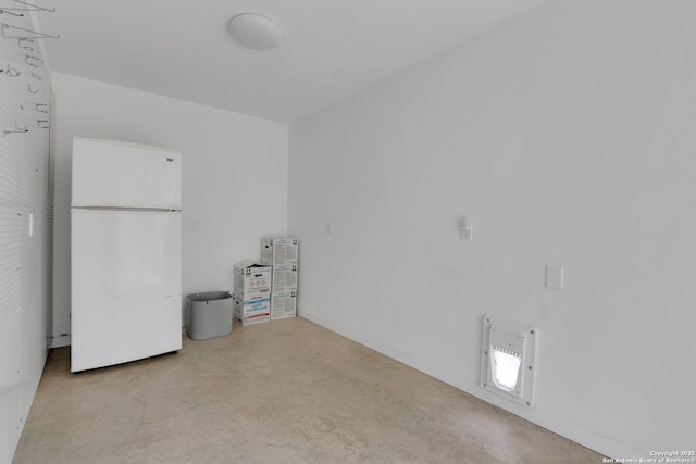 interior space featuring white fridge