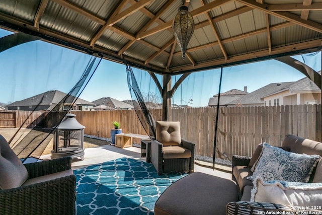 view of patio / terrace featuring a gazebo and an outdoor living space