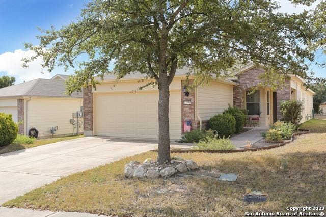 ranch-style home with a garage