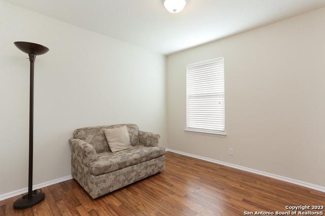 living area featuring hardwood / wood-style flooring