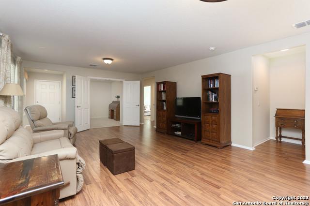 living room with light hardwood / wood-style floors