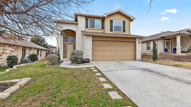 front of property featuring a garage and a front lawn