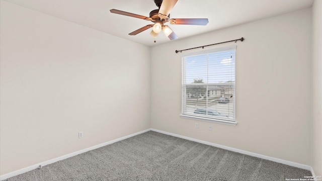 unfurnished room featuring carpet flooring and ceiling fan