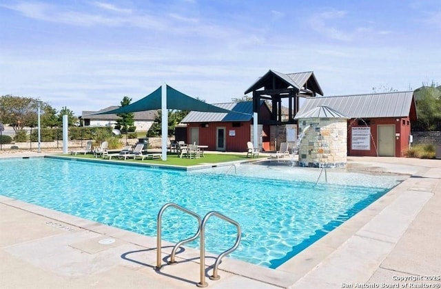 view of pool featuring a patio