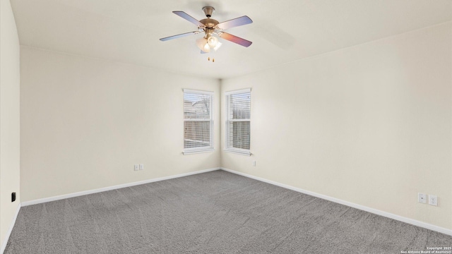 unfurnished room with carpet flooring and ceiling fan