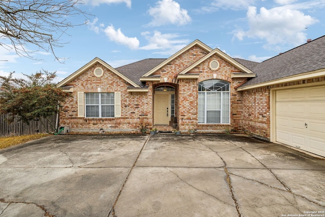 single story home featuring a garage