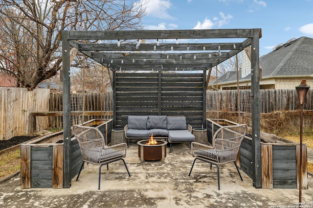 view of patio / terrace with a pergola and an outdoor living space with a fire pit