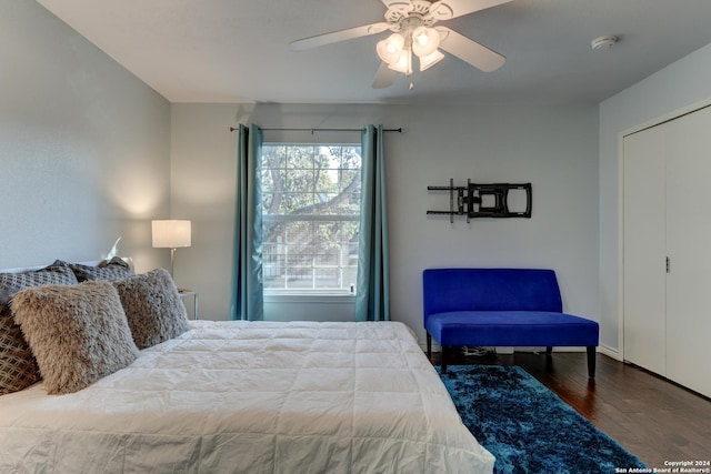 bedroom featuring ceiling fan and hardwood / wood-style floors