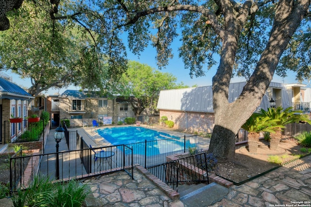 view of pool with a patio area