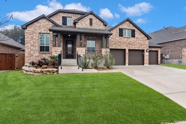 craftsman-style house featuring a porch, a garage, and a front lawn