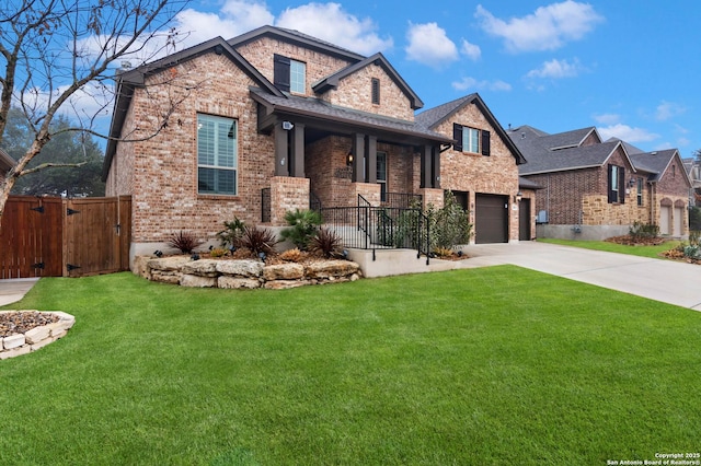 craftsman house featuring a porch, a garage, and a front yard