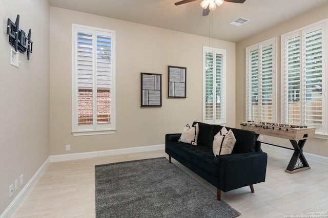 living room featuring ceiling fan