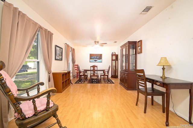 interior space with ceiling fan and light wood-type flooring