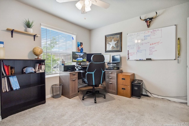 office with light carpet and ceiling fan