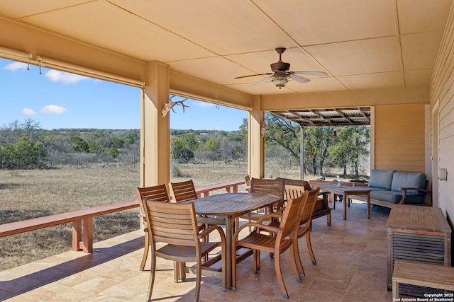 view of patio / terrace featuring an outdoor living space and ceiling fan