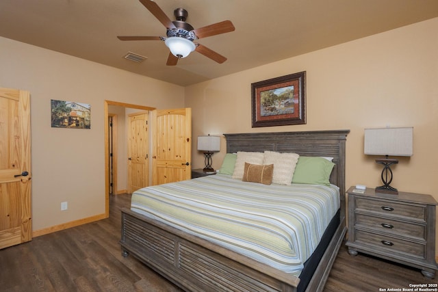 bedroom featuring dark wood-type flooring and ceiling fan