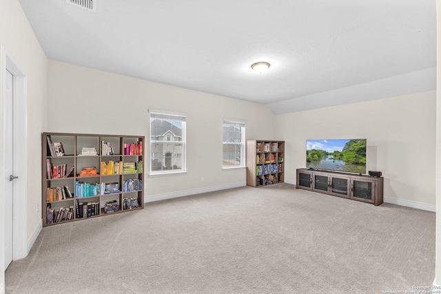 playroom featuring lofted ceiling and carpet floors