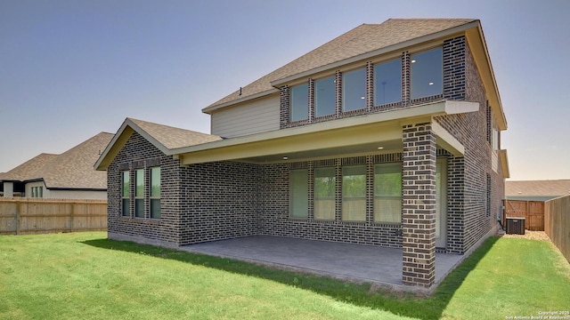 1355 Azul Way, San Antonio, TX 78224 - rear view of house with a patio, a shingled roof, central AC unit, and brick siding