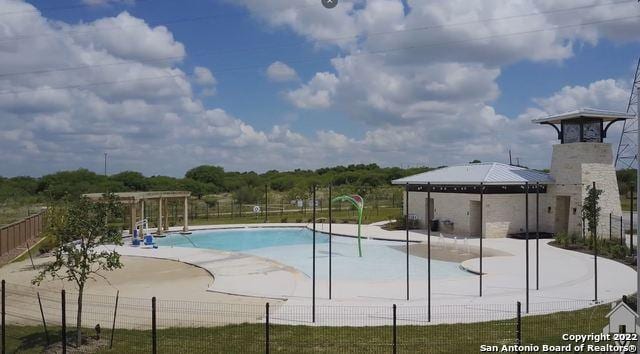 view of pool with a gazebo and a patio