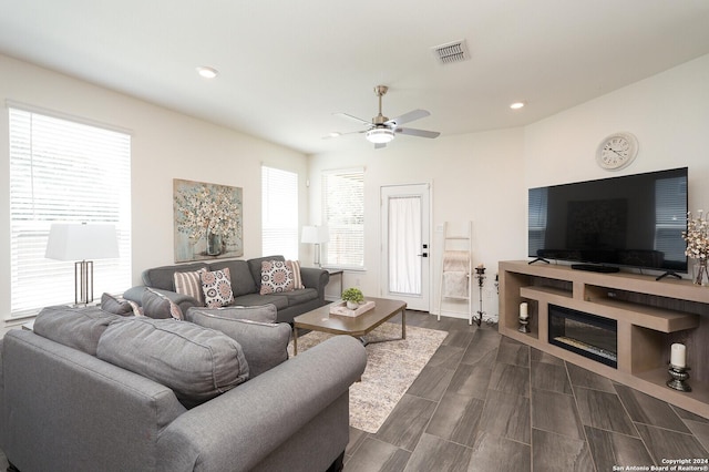 living room featuring ceiling fan