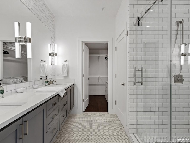 bathroom with vanity and walk in shower