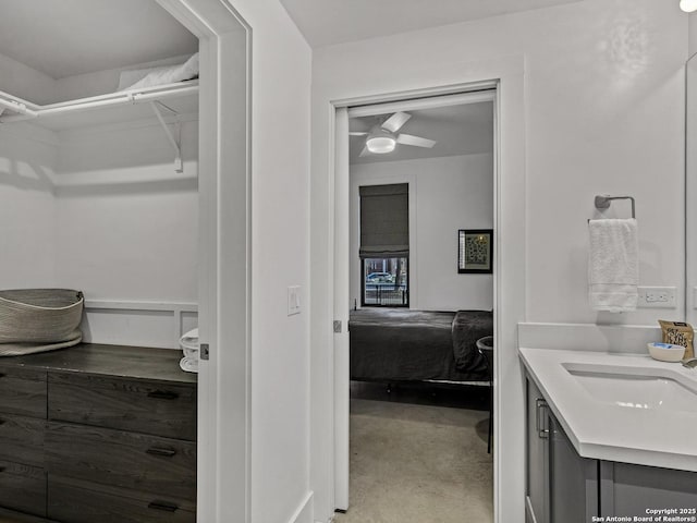 bathroom with vanity and concrete floors