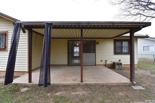 back of house with a patio