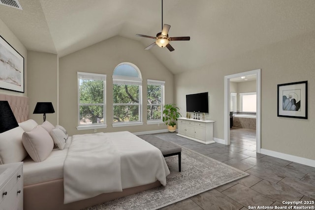 bedroom featuring high vaulted ceiling, ceiling fan, and ensuite bathroom