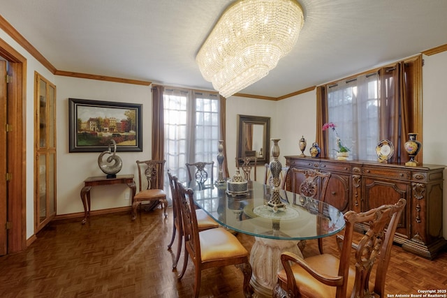 dining room featuring dark parquet flooring, crown molding, and an inviting chandelier