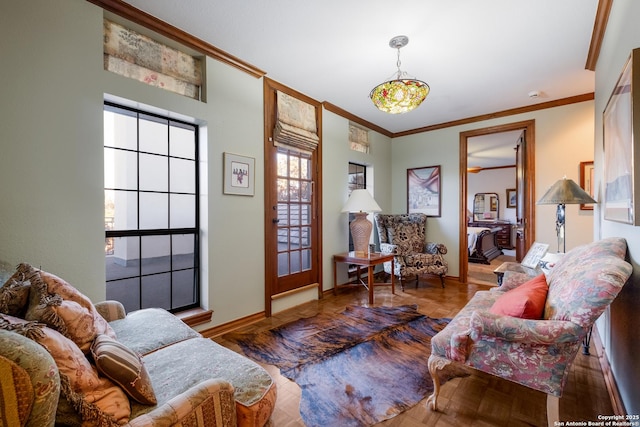 living room featuring crown molding and parquet floors